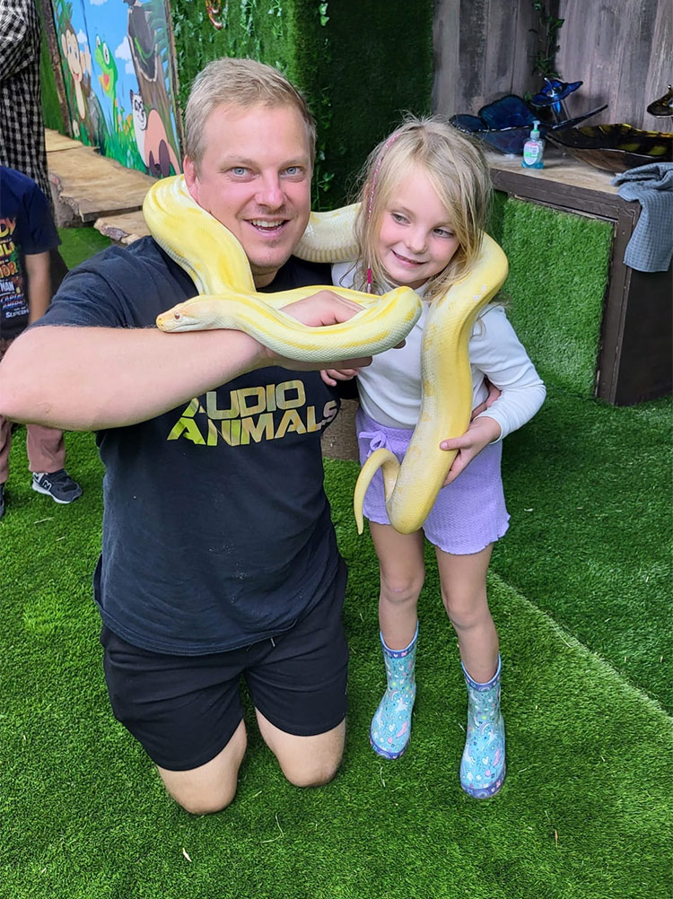 party-cave-animal-handling-snake